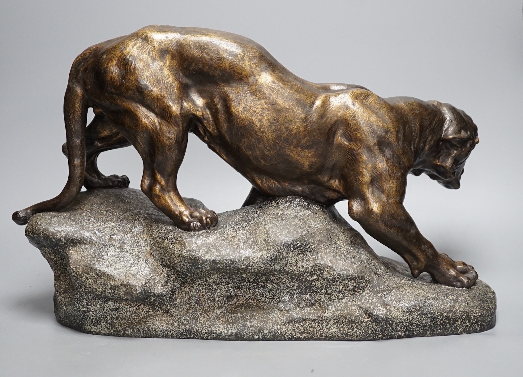 After Thomas François Cartier (1879-1943) patinated spelter model of a tiger 49cm long